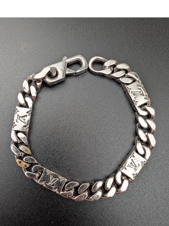 Louis Vuitton Jewelry - Louis Vuitton Silver-Tone Curb Bracelet with Monogram Panels